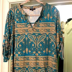 Othyroce teal and gold paisley tunic made of polyester and spandex.